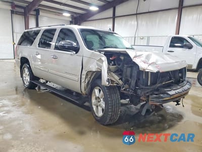 Czwarte zdjęcie samochodu z boku: 2007 CHEVROLET SUBURBAN K1500 VIN:3GNFK16377G308761 - miniatura