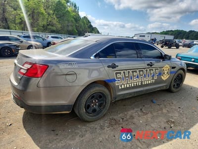 Trzecie zdjęcie samochodu z tyłu: 2017 FORD TAURUS POLICE INTERCEPTOR VIN:1FAHP2MK8HG145074 - miniatura