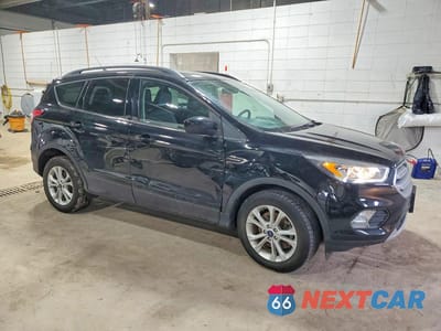 Czwarte zdjęcie samochodu z boku: 2018 FORD ESCAPE SEL VIN:1FMCU9HDXJUD29579 - miniatura