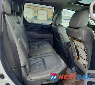 Zdjęcie 10 z 12 samochodu: 2009 HONDA RIDGELINE RTL VIN:5FPYK16559B108027 - miniatura