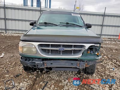 Piąte zdjęcie samochodu w środku: 1999 FORD EXPLORER VIN:1FMDU34E8XUB73423 - miniatura