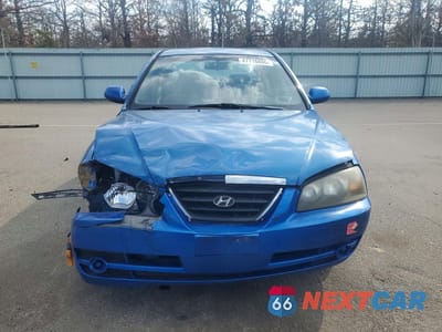 Piąte zdjęcie samochodu w środku: 2005 HYUNDAI ELANTRA GLS VIN:KMHDN46D75U996395 - miniatura