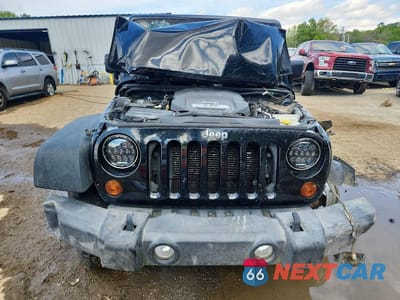 Piąte zdjęcie samochodu w środku: 2013 JEEP WRANGLER UNLIMITED SPORT VIN:1C4BJWDG9DL545196 - miniatura