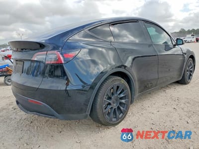 Trzecie zdjęcie samochodu z tyłu: 2023 TESLA MODEL Y VIN:7SAYGDEE5PA154709 - miniatura