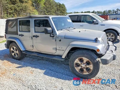 Czwarte zdjęcie samochodu z boku: 2018 JEEP WRANGLER UNLIMITED SAHARA VIN:1C4HJWEG5JL919145 - miniatura