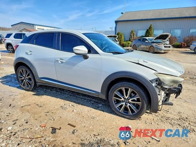 Czwarte zdjęcie samochodu z boku: 2016 MAZDA CX-3 GRAND TOURING VIN:JM1DKBD77G0121441 - miniatura