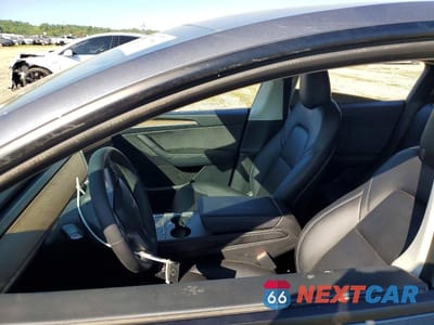 Zdjęcie 7 z 12 samochodu: 2022 TESLA MODEL Y VIN:7SAYGDEE9NF574991 - miniatura