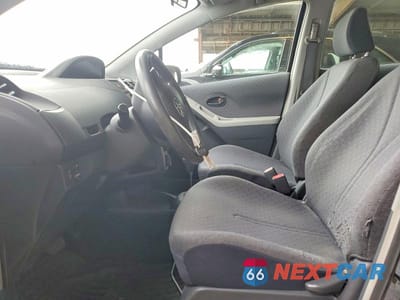 Zdjęcie 7 z 12 samochodu: 2009 TOYOTA YARIS BASE VIN:JTDKT903895275419 - miniatura