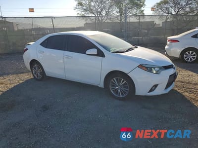 Czwarte zdjęcie samochodu z boku: 2014 TOYOTA COROLLA LE PREMIUM VIN:5YFBURHE9EP070837 - miniatura