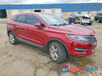 Czwarte zdjęcie samochodu z boku: 2015 LINCOLN MKC VIN:5LMCJ1A99FUJ14652 - miniatura