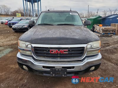 Piąte zdjęcie samochodu w środku: 2005 GMC NEW SIERRA K1500 VIN:1GTEK19B15E340343 - miniatura
