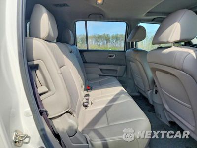 Zdjęcie 11 z 12 samochodu: 2013 HONDA PILOT EXL VIN:5FNYF4H52DB031914 - miniatura