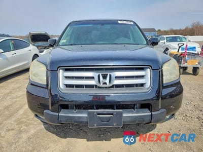 Piąte zdjęcie samochodu w środku: 2006 HONDA PILOT EX VIN:2HKYF18586H558245 - miniatura