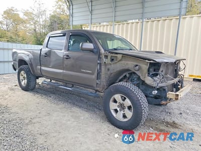 Czwarte zdjęcie samochodu z boku: 2011 TOYOTA TACOMA V6 VIN:5TFMU4FN1BX002835 - miniatura