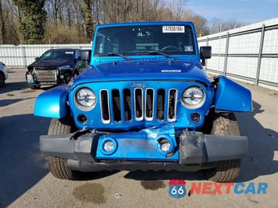 Piąte zdjęcie samochodu w środku: 2016 JEEP WRANGLER UNLIMITED SAHARA VIN:1C4BJWEG7GL156866 - miniatura