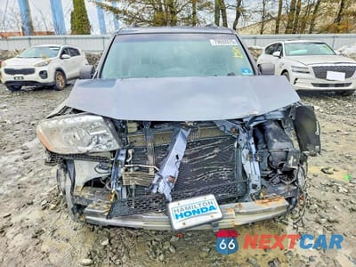 Piąte zdjęcie samochodu w środku: 2011 HONDA PILOT EXLN VIN:5FNYF4H7XBB009481 - miniatura