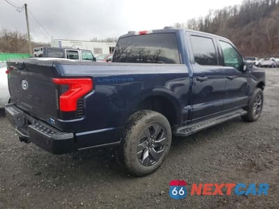 Trzecie zdjęcie samochodu z tyłu: 2024 FORD F150 LIGHTNING XLT VIN:1FT6W3L74RWG26910 - miniatura