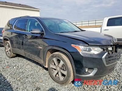 Czwarte zdjęcie samochodu z boku: 2019 CHEVROLET TRAVERSE LT VIN:1GNEVHKW4KJ212427 - miniatura