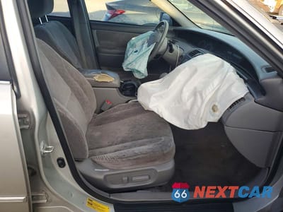 Zdjęcie 13 z 13 samochodu: 2001 TOYOTA AVALON XL VIN:4T1BF28B81U166930 - miniatura