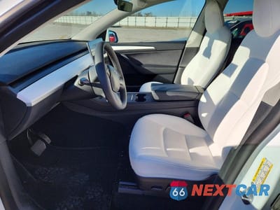 Zdjęcie 7 z 11 samochodu: 2022 TESLA MODEL Y VIN:7SAYGAEE2NF521886 - miniatura