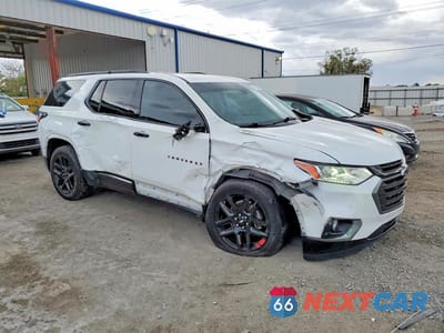 Czwarte zdjęcie samochodu z boku: 2019 CHEVROLET TRAVERSE PREMIER VIN:1GNERKKW3KJ269865 - miniatura