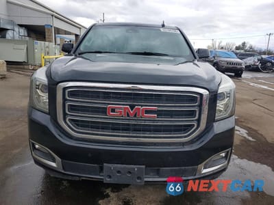 Piąte zdjęcie samochodu w środku: 2017 GMC YUKON SLT VIN:1GKS2BKC4HR235907 - miniatura