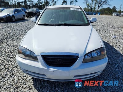 Piąte zdjęcie samochodu w środku: 2004 HYUNDAI ELANTRA GLS VIN:KMHDN46D14U797972 - miniatura