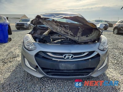 Piąte zdjęcie samochodu w środku: 2013 HYUNDAI ELANTRA GT BASE VIN:KMHD35LE0DU150231 - miniatura