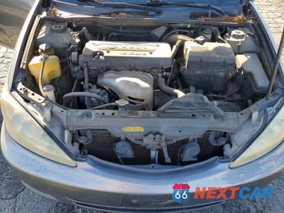 Zdjęcie 11 z 12 samochodu: 2002 TOYOTA CAMRY LE VIN:JTDBE32K720101601 - miniatura
