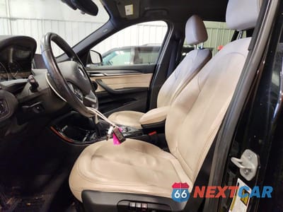 Zdjęcie 7 z 11 samochodu: 2016 BMW X1 XDRIVE28I VIN:WBXHT3Z38G4A51067 - miniatura