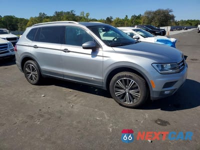 Czwarte zdjęcie samochodu z boku: 2019 VOLKSWAGEN TIGUAN SE VIN:3VV3B7AX4KM110563 - miniatura