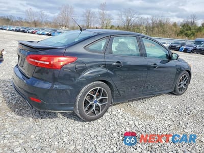 Trzecie zdjęcie samochodu z tyłu: 2015 FORD FOCUS SE VIN:1FADP3F27FL374271 - miniatura