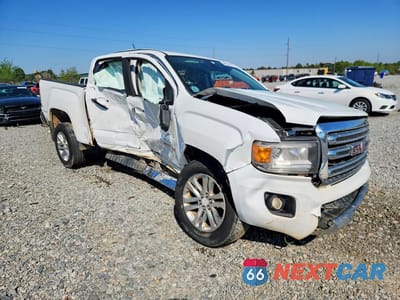 Czwarte zdjęcie samochodu z boku: 2016 GMC CANYON SLT VIN:1GTG5DE30G1298886 - miniatura
