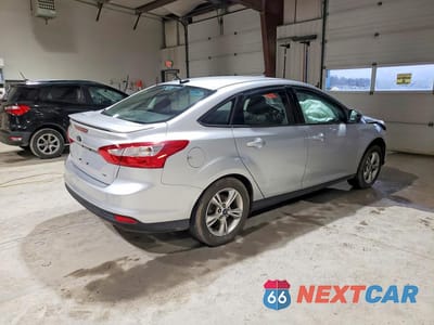 Trzecie zdjęcie samochodu z tyłu: 2012 FORD FOCUS SE VIN:1FAHP3F24CL181105 - miniatura