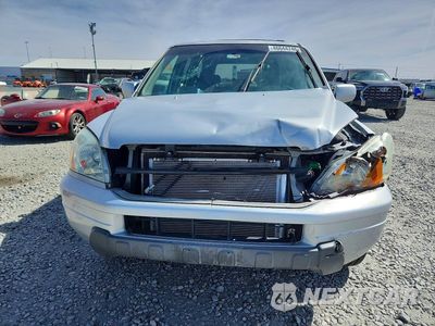 Piąte zdjęcie samochodu w środku: 2004 HONDA PILOT EX VIN:2HKYF18414H512180 - miniatura