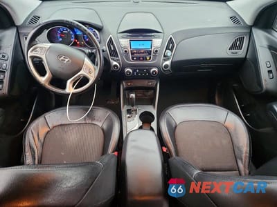 Zdjęcie 8 z 12 samochodu: 2013 HYUNDAI TUCSON GLS VIN:KM8JUCAC0DU573736 - miniatura