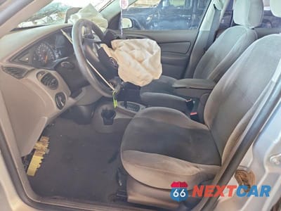 Zdjęcie 7 z 11 samochodu: 2003 FORD FOCUS SE VIN:1FAFP34PX3W152924 - miniatura