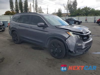 Czwarte zdjęcie samochodu z boku: 2021 HONDA PILOT SE VIN:5FNYF5H2XMB010174 - miniatura