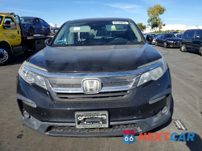 Piąte zdjęcie samochodu w środku: 2019 HONDA PILOT LX VIN:5FNYF6H16KB043263 - miniatura