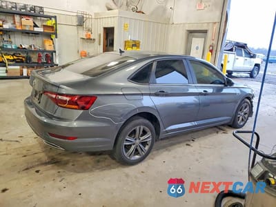 Trzecie zdjęcie samochodu z tyłu: 2019 VOLKSWAGEN JETTA S VIN:3VWC57BU3KM080124 - miniatura