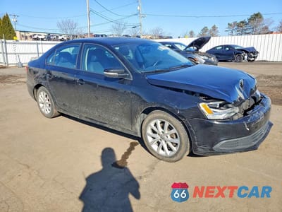 Czwarte zdjęcie samochodu z boku: 2011 VOLKSWAGEN JETTA SE VIN:3VWDX7AJ9BM013386 - miniatura
