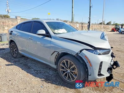 Czwarte zdjęcie samochodu z boku: 2026 BMW X6 XDRIVE40I VIN:5UX33EX06T9158395 - miniatura