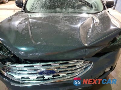 Zdjęcie 12 z 14 samochodu: 2021 FORD EDGE TITANIUM VIN:2FMPK3K90MBA18083 - miniatura