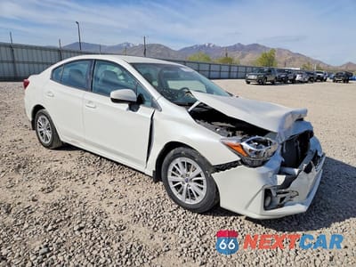 Czwarte zdjęcie samochodu z boku: 2017 SUBARU IMPREZA PREMIUM PLUS VIN:4S3GKAD64H3604187 - miniatura