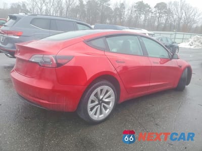 Trzecie zdjęcie samochodu z tyłu: 2023 TESLA MODEL 3 VIN:5YJ3E1EA8PF434409 - miniatura