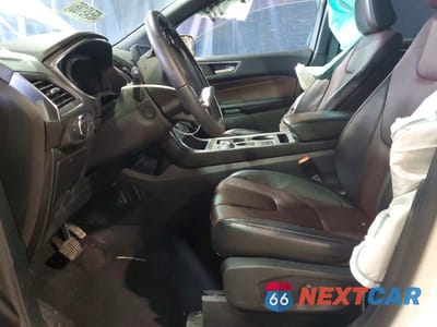 Zdjęcie 7 z 13 samochodu: 2021 FORD EDGE TITANIUM VIN:2FMPK4K9XMBA25631 - miniatura