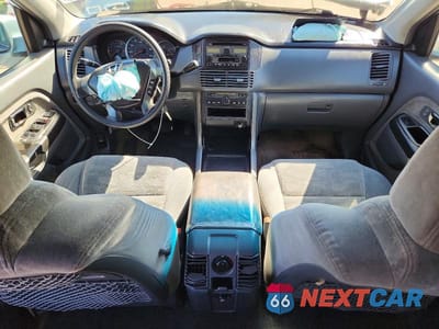 Zdjęcie 8 z 13 samochodu: 2003 HONDA PILOT EX VIN:2HKYF184X3H577107 - miniatura