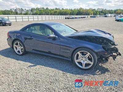 Czwarte zdjęcie samochodu z boku: 2011 MERCEDES-BENZ SL 550 VIN:WDBSK7BA6BF163008 - miniatura