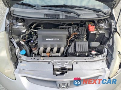 Zdjęcie 11 z 12 samochodu: 2007 HONDA FIT S VIN:JHMGD38647S012131 - miniatura