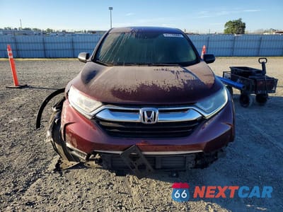 Piąte zdjęcie samochodu w środku: 2018 HONDA CR-V LX VIN:2HKRW5H33JH415917 - miniatura